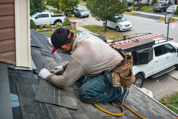 Professional Roofing technician working in Wood River, IL